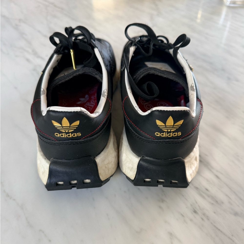 adidas Black and White Retro Runner Sneakers with Gold Accents - Picture 3 of 5